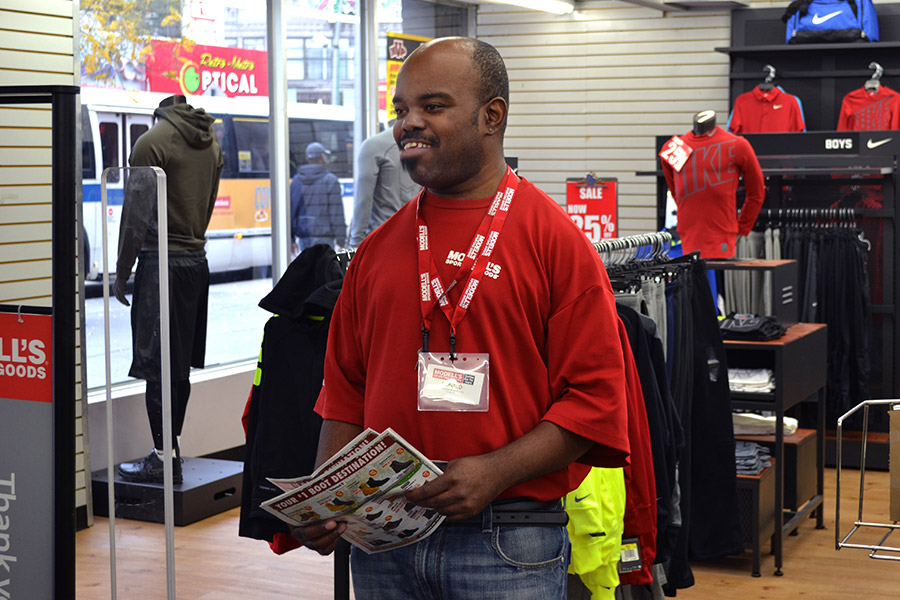 man at modell's store