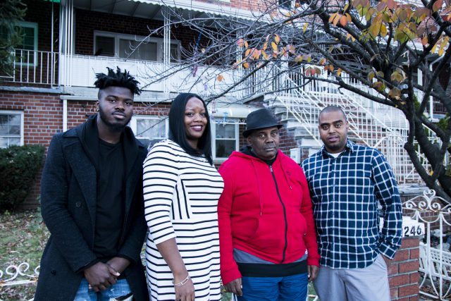 Direct Support Professional Yusuf Atanda, Residence Coordinator Keisha Briggs, Ralph Avenue resident Peter and Program Coordinator Pedro Vargas outside the HeartShare group home.